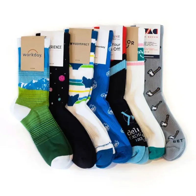 Custom Volleyball Socks group display showing multiple pairs of custom branded socks